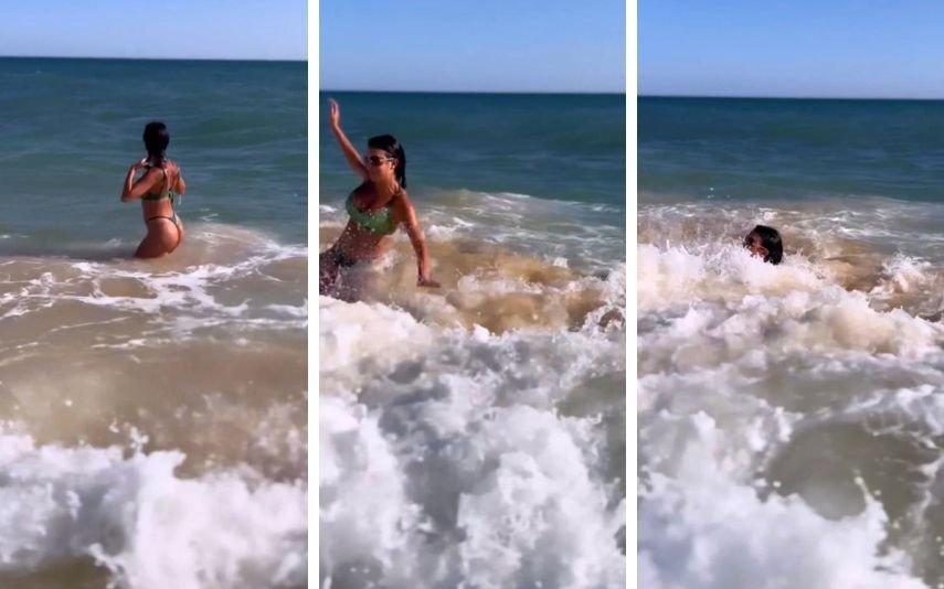 Georgina Rodriguez Arrastada por onda na praia