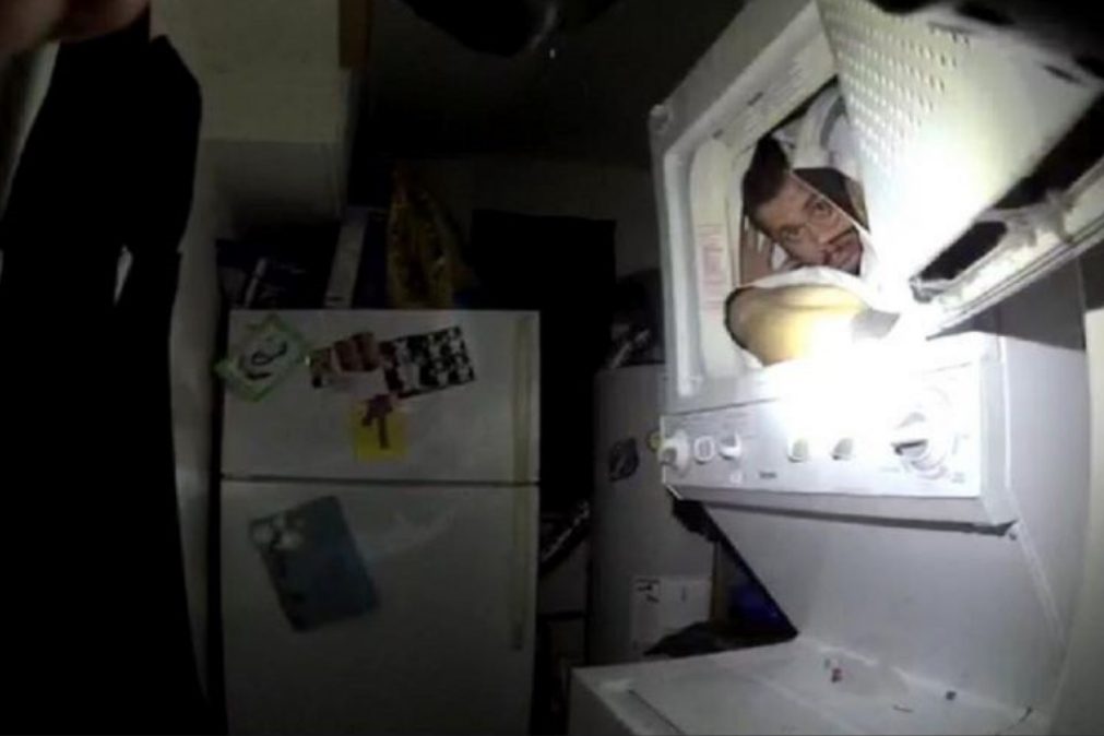 Homem em fuga apanhado pela polícia dentro de máquina de secar
