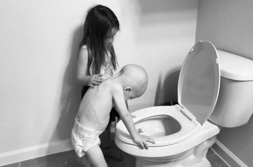 Caso real: Foto de menina a apoiar irmão com leucemia torna-se viral