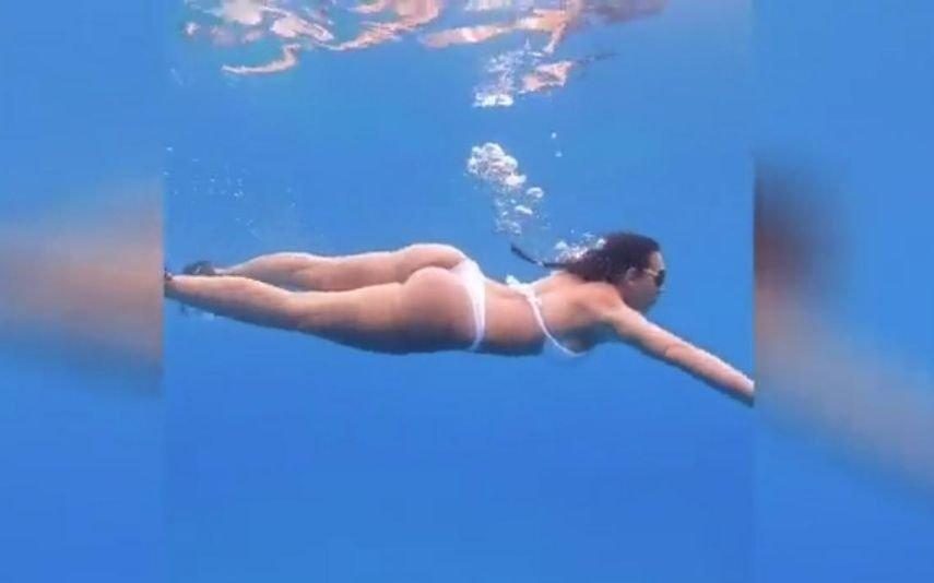 Georgina Rodriguez O mergulho em alto mar de barbatanas e biquíni branco de fio dental (vídeo)